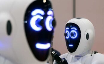 Egy pár 1x androidot mutatnak be a robotikával és az automatizálásról szóló Nemzetközi Konferencián (ICRA), az Excel -ben, 2023. május 30 -án, Londonban, Angliában.